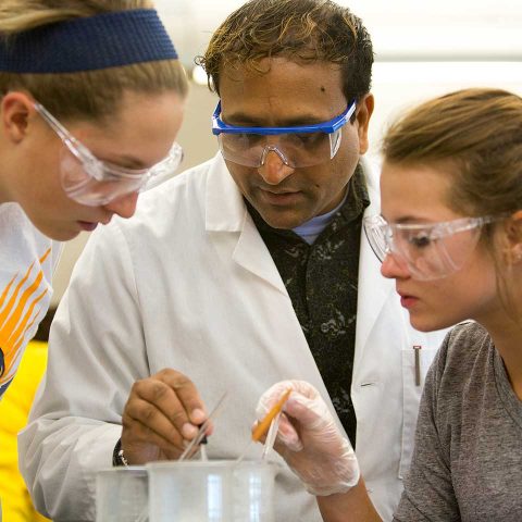 Clarke chemistry major students experimenting in class.