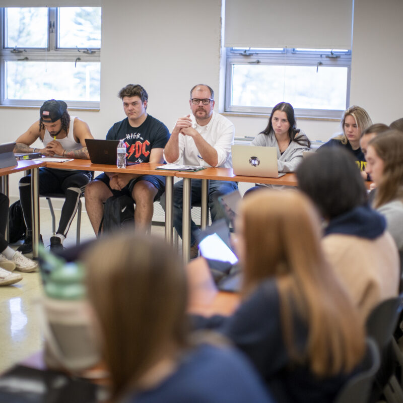 A classroom full of students in a circle.