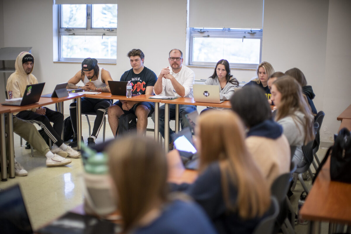 A classroom full of students in a circle. - Full Size