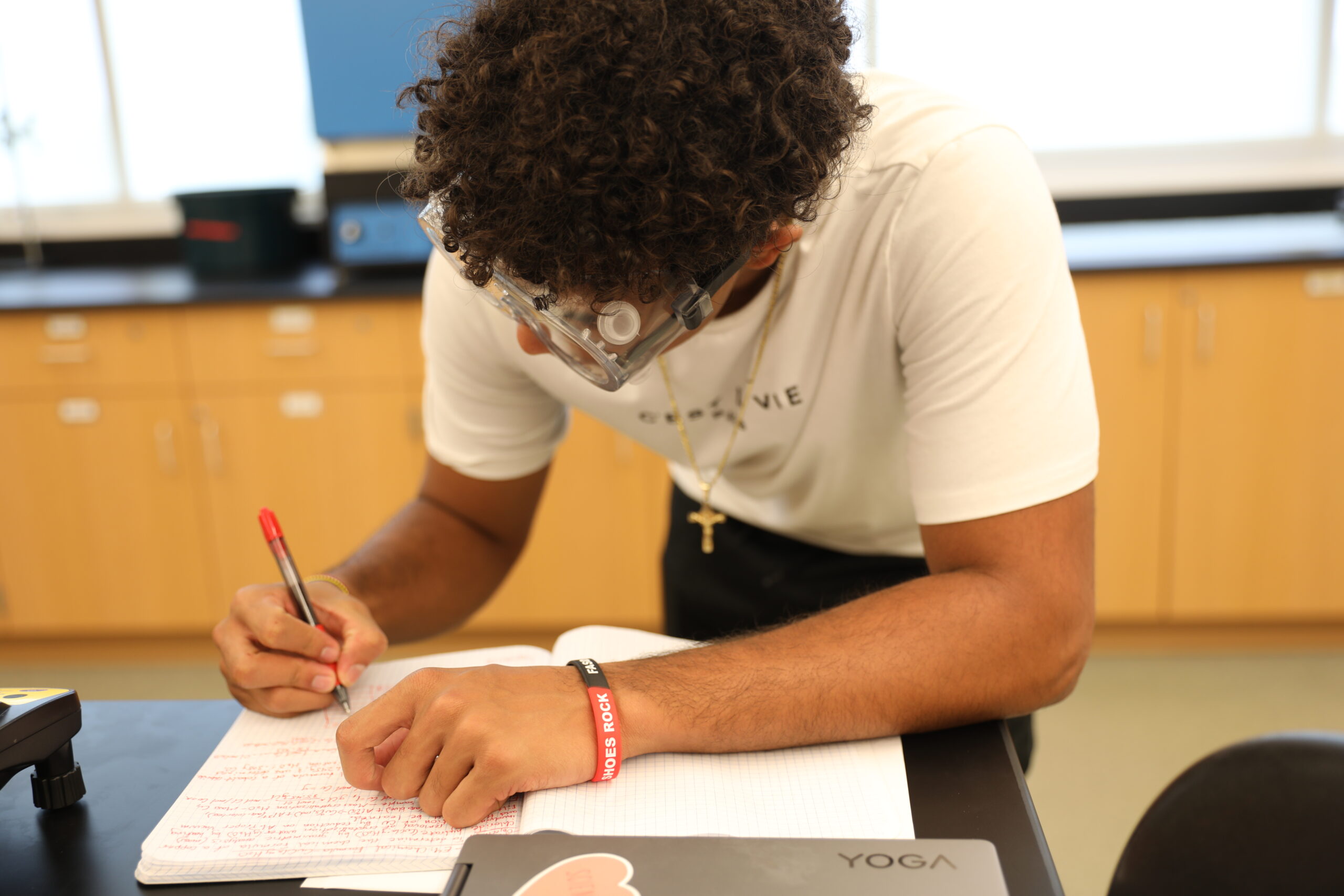 Clarke University Biochemistry students working in lab.