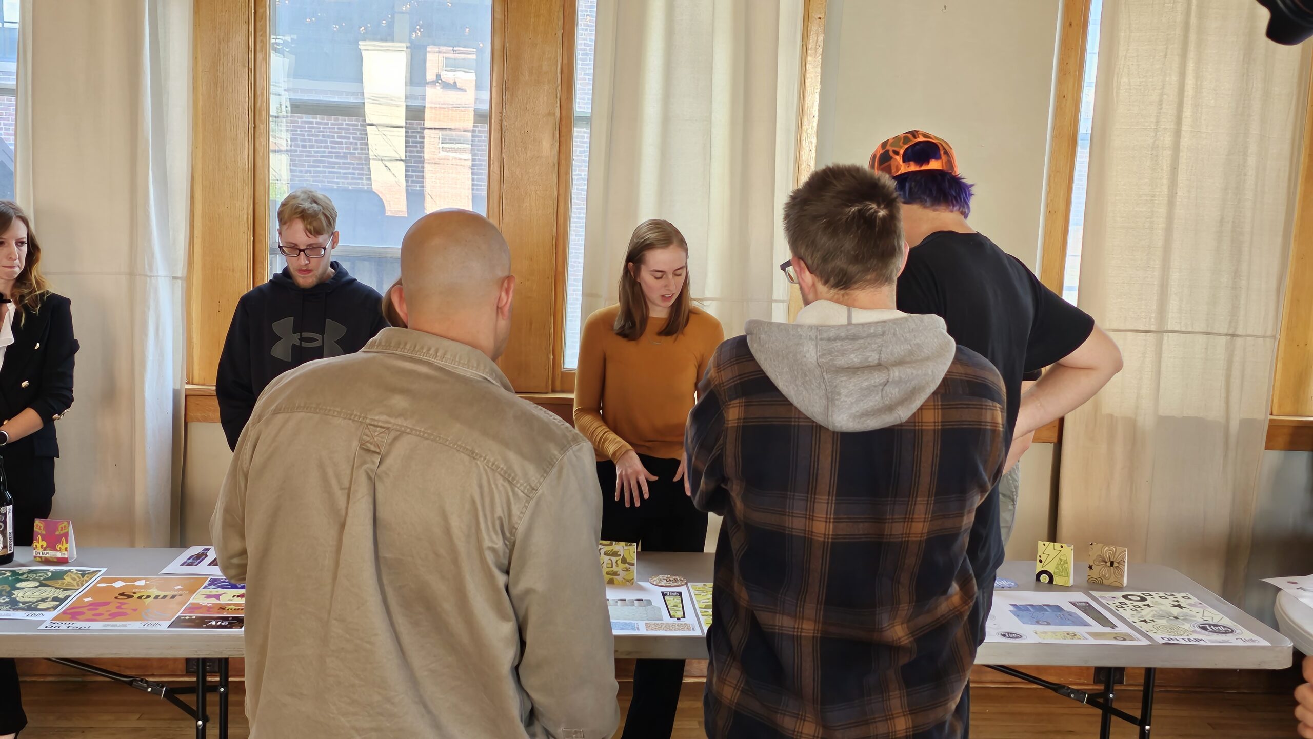 Clarke University Art Education students making packaging design for a community project.