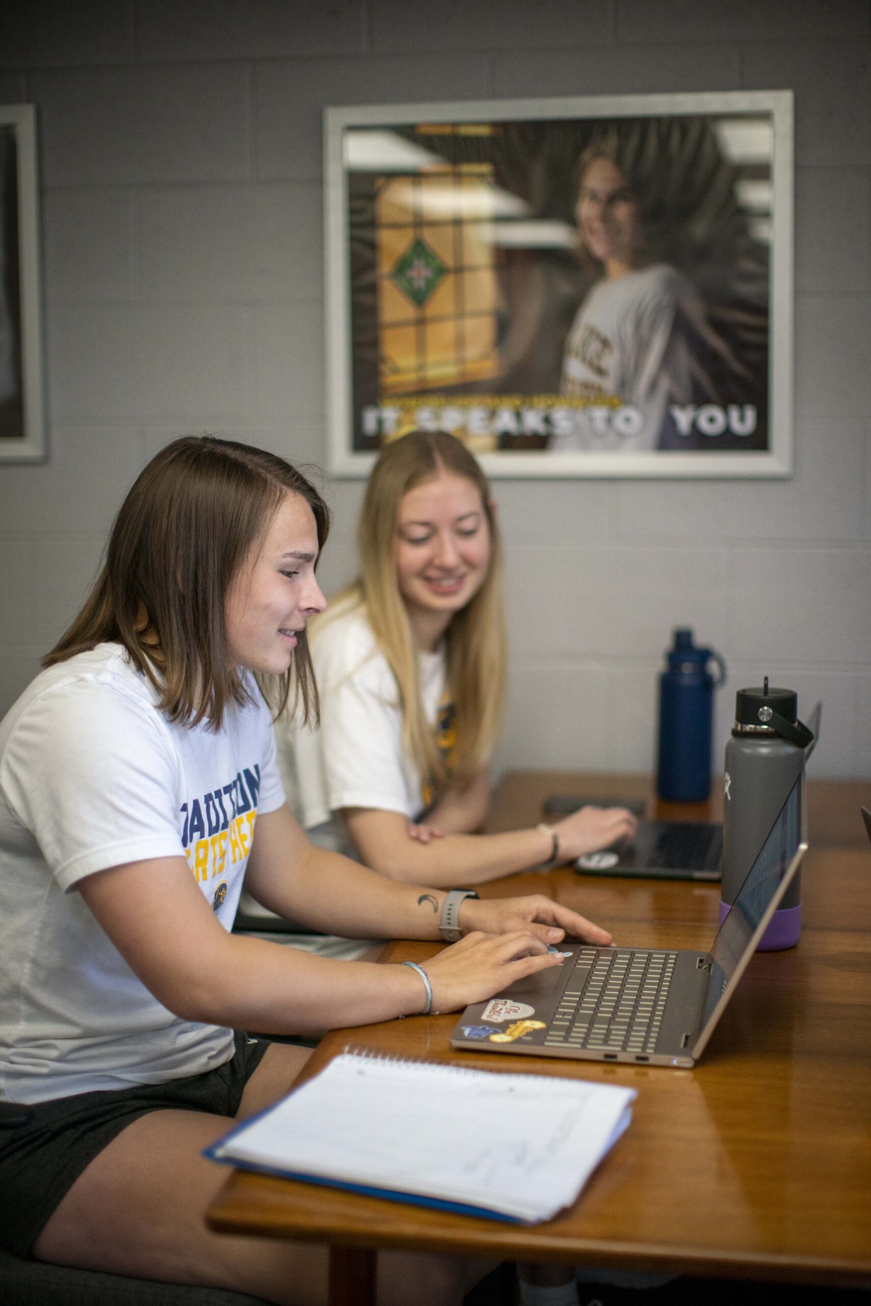 Clarke University Senior Philosophy Major students studying on Clarke's campus.