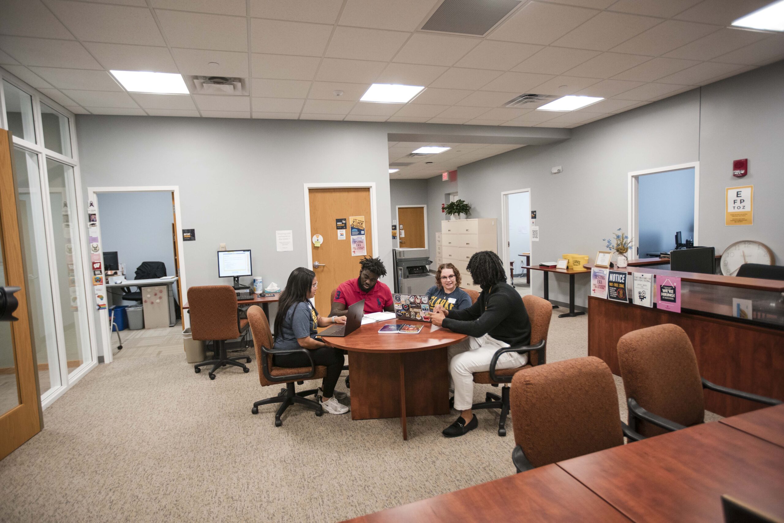 Clarke University students in class working on a project.