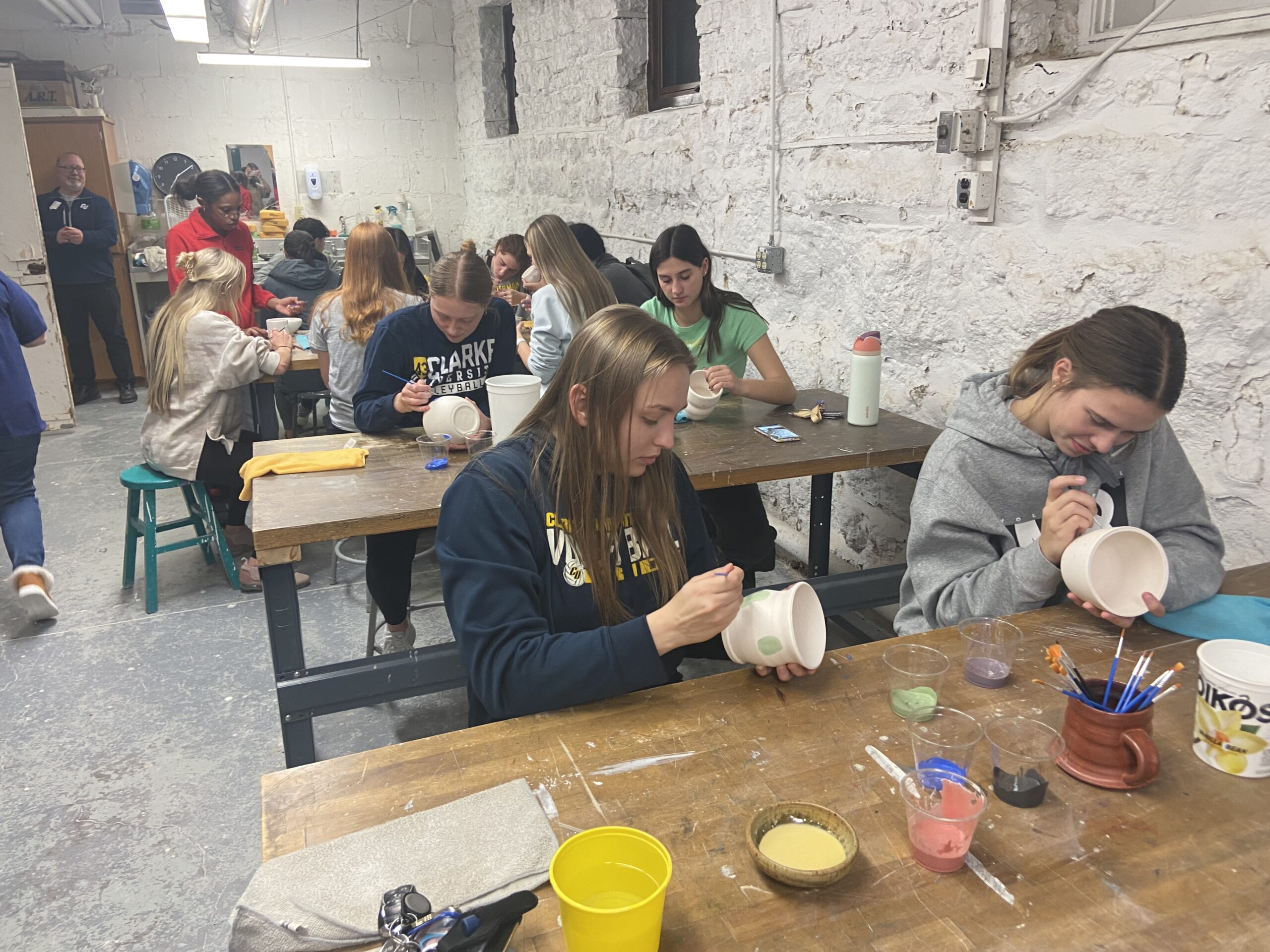 Clarke University Art students in studio on campus.