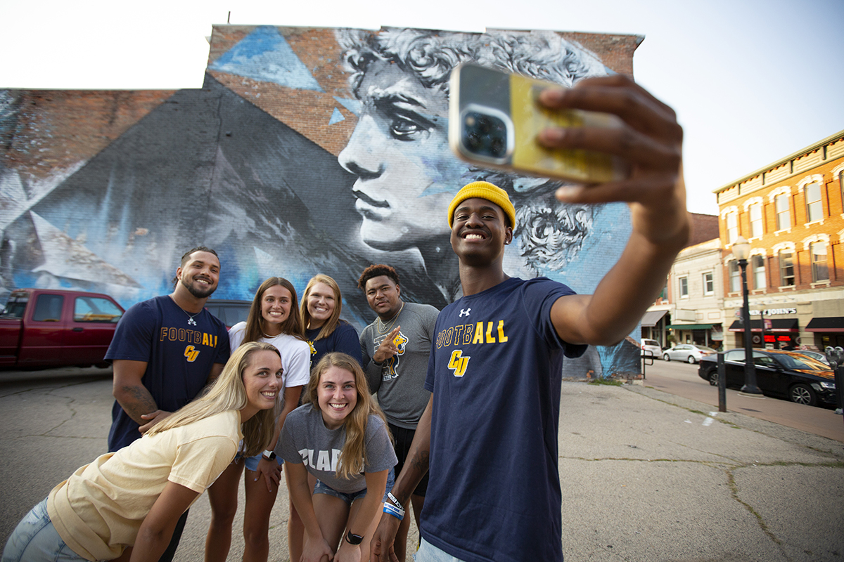 Clarke University Communication Degree students engaging while working on a project in Dubuque