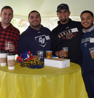 Group of alumni at the homecoming tent party