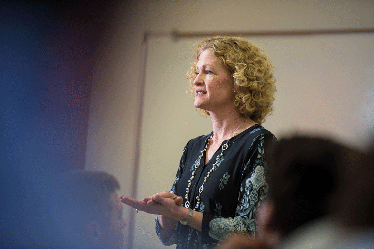 Clarke University business administration professor in class - Full Size