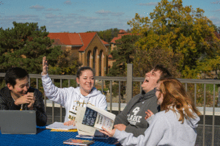 Students in Clarke's business administration degree program enjoying a break