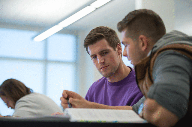 Students studying in Clarke University's Business Marketing Class
