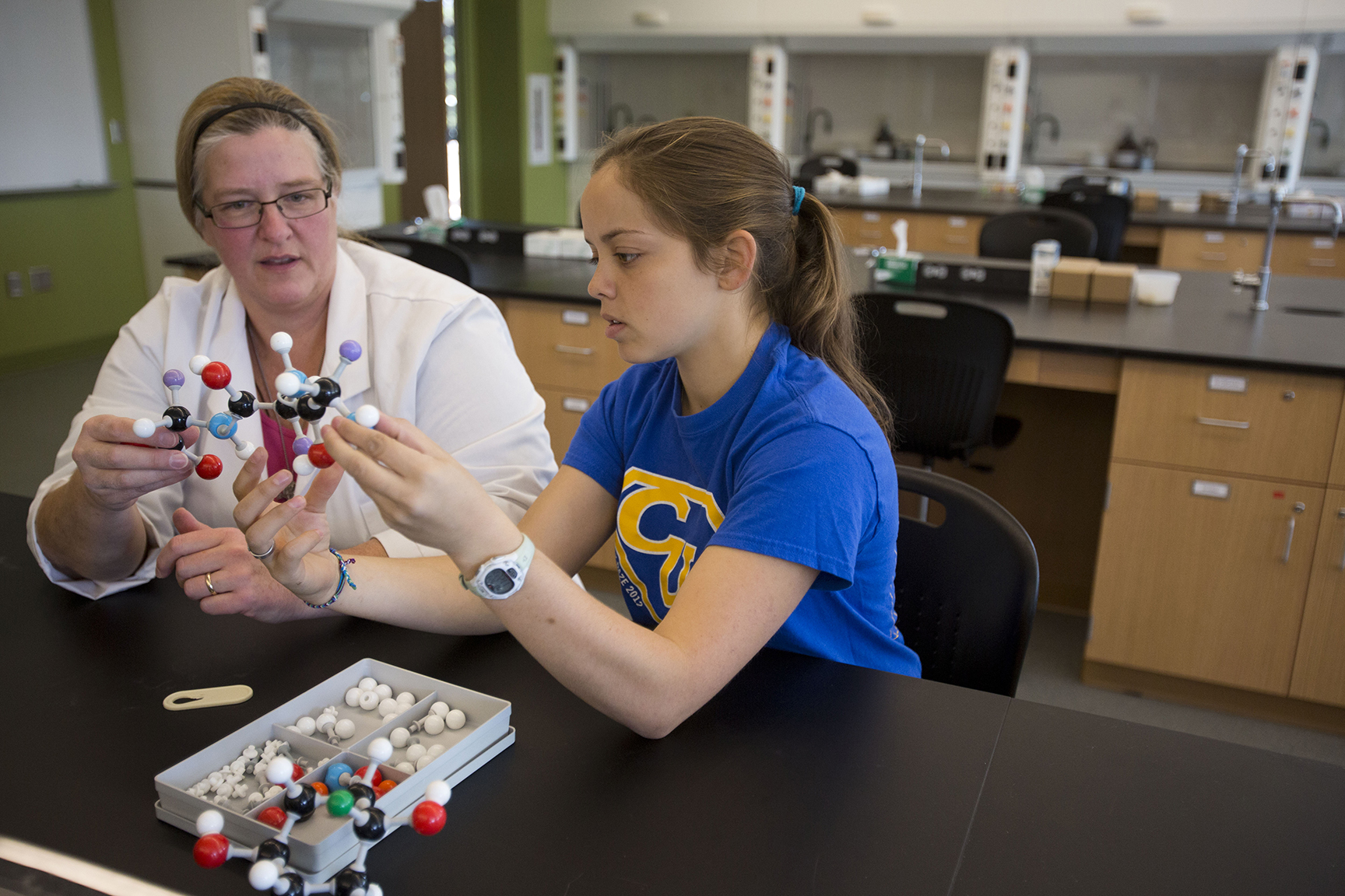 Clarke University Chemistry Degree students in class getting hands-on learning