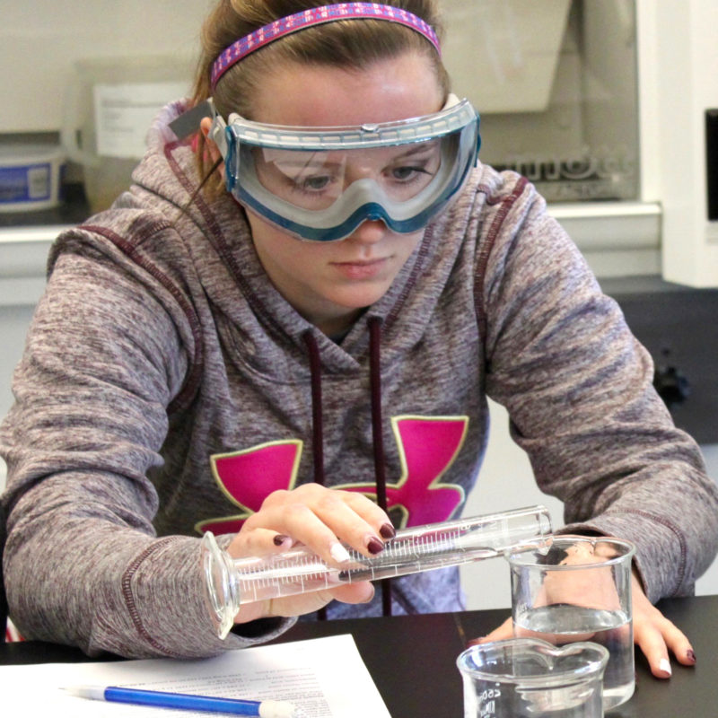 Clarke University Chemistry Major Student learning in class