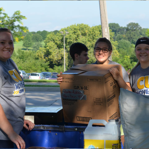 Clarke students helping with the move in process