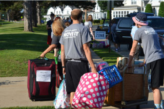 Moving students into their dorm rooms