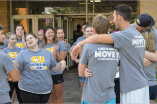 Connect move in crew rejoicing being finished with moving everything in.