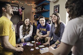 Emily with friends in dorm