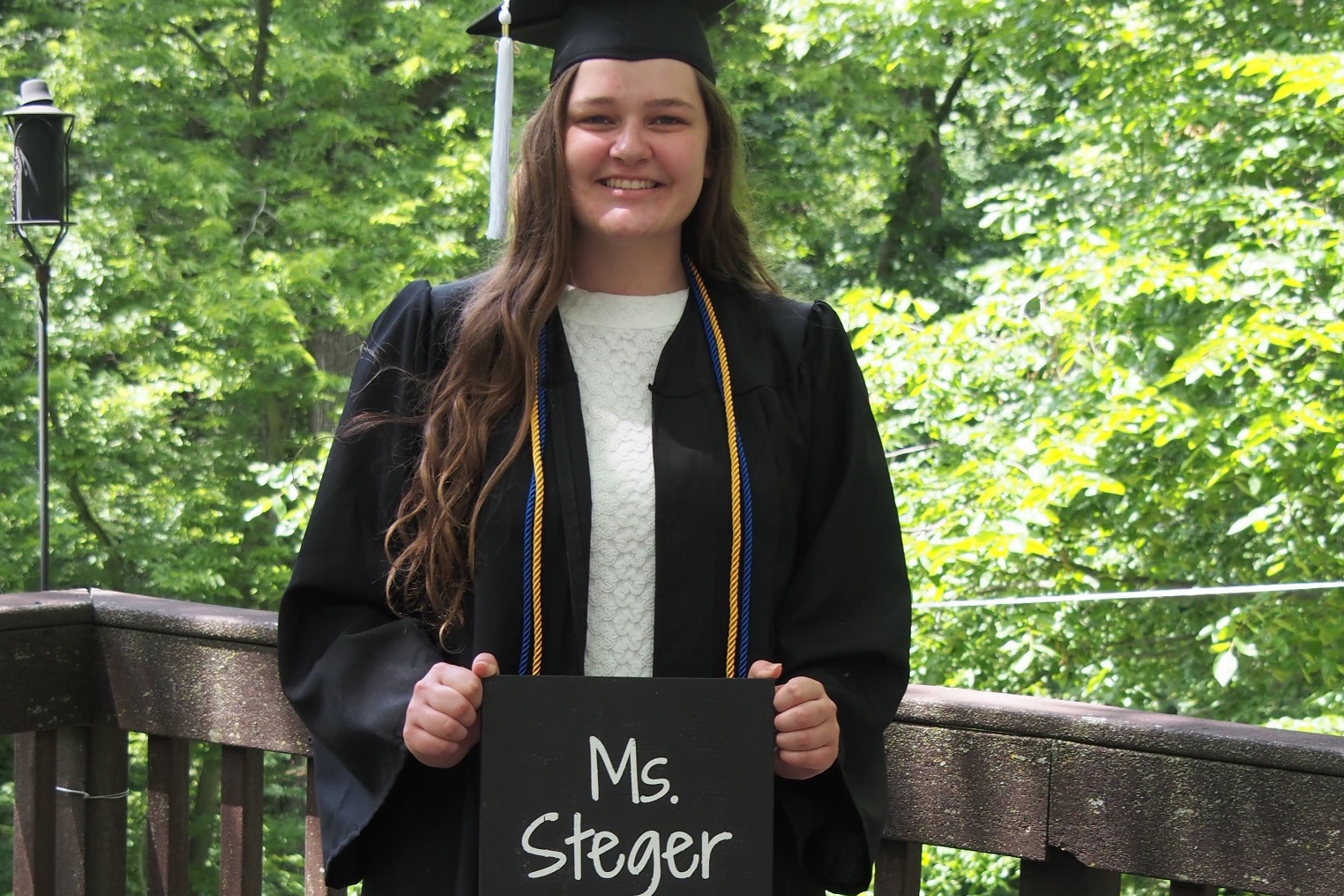 Clarke University education graduate, Lindsey Steger, posing with teaching