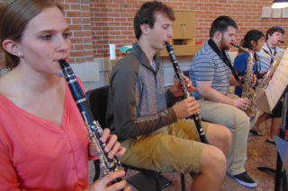 Clarke University Music Students playing in band