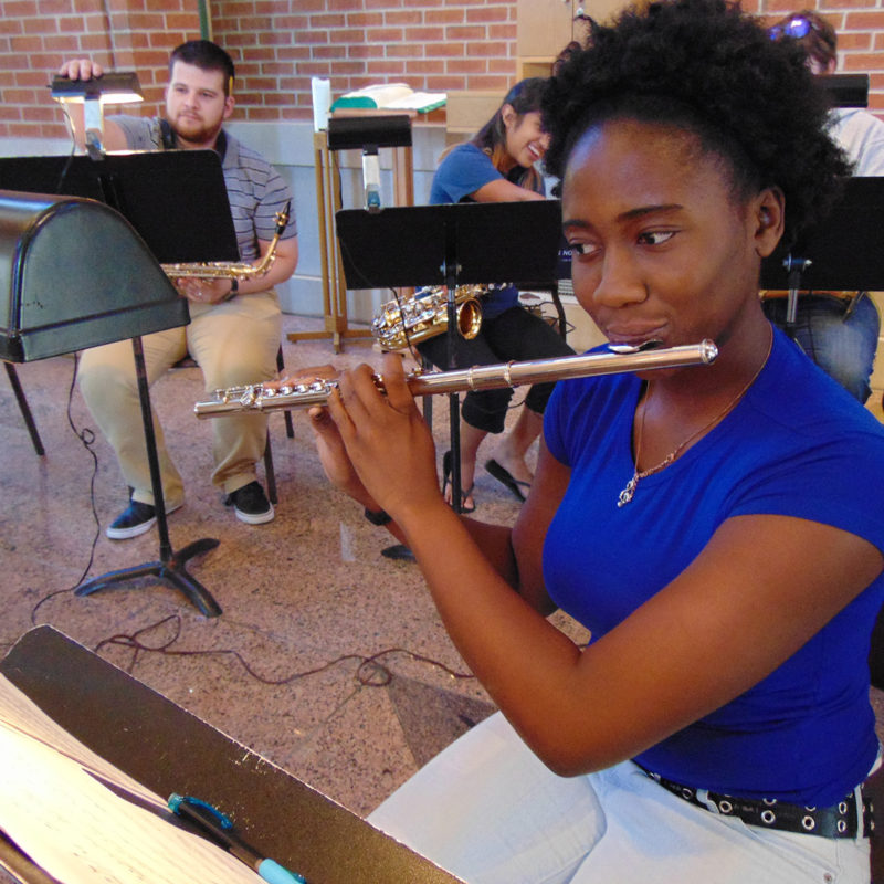 Clarke University Music Major Students Performing in a Band