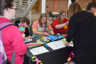 Spanish Minor students at Clarke University create Dia De Los Muertos decorations at Clarke University