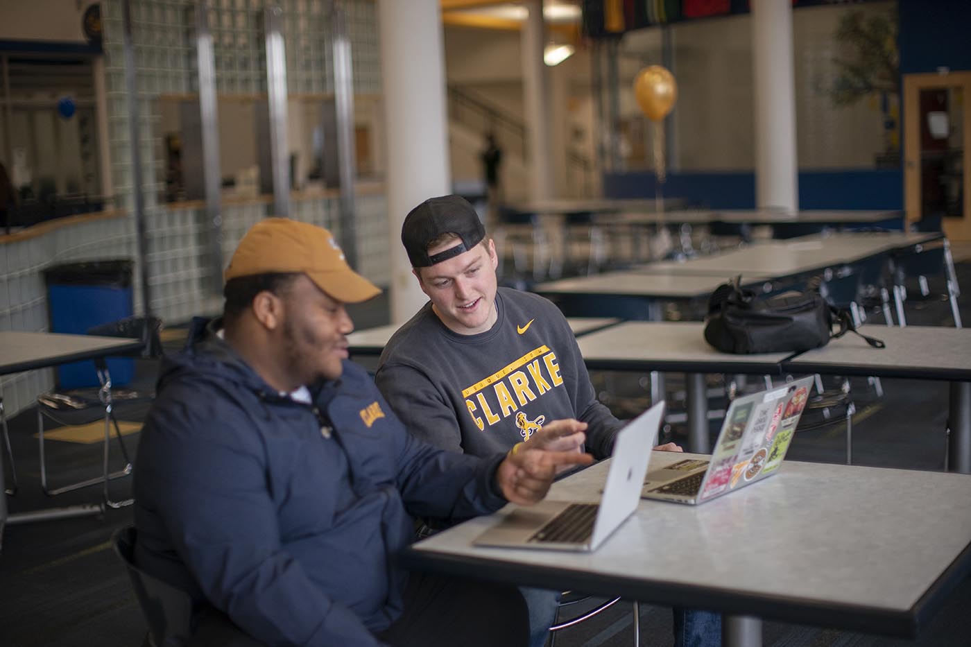 Clarke University Master of Business Administration student receiving feedback.