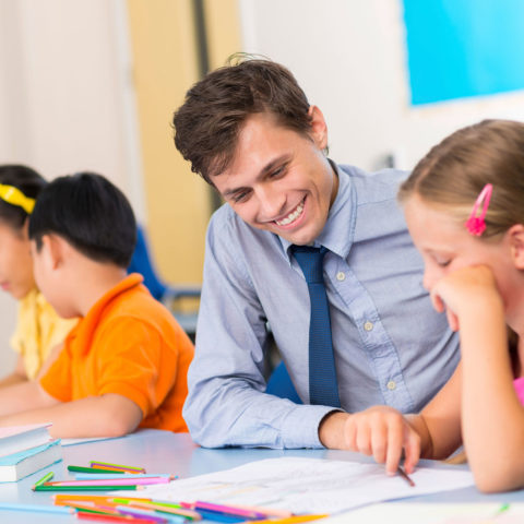 Clarke University Education Major working with students in the classroom