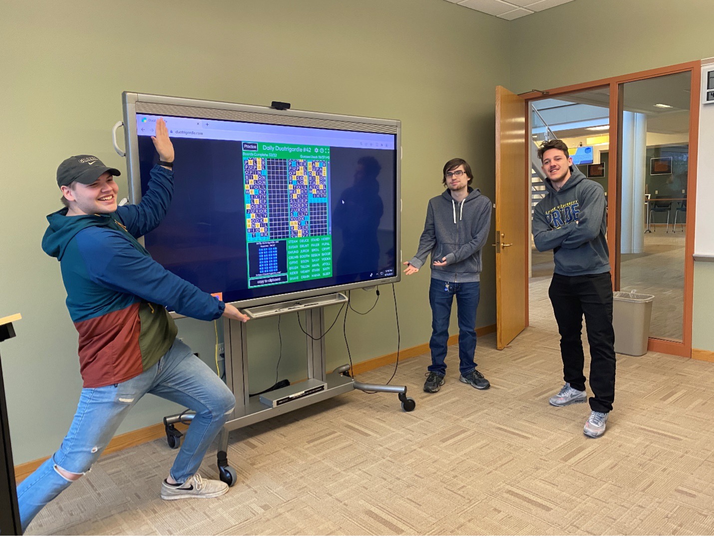 Clarke University Mathematics students in class working through complex math problems with their professor