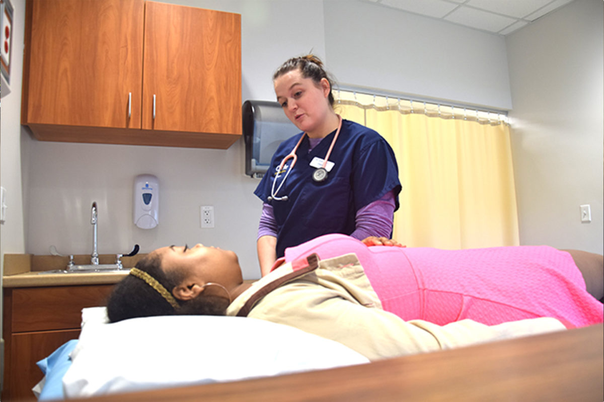 Clarke Student gaining hands on nursing training experience - Full Size