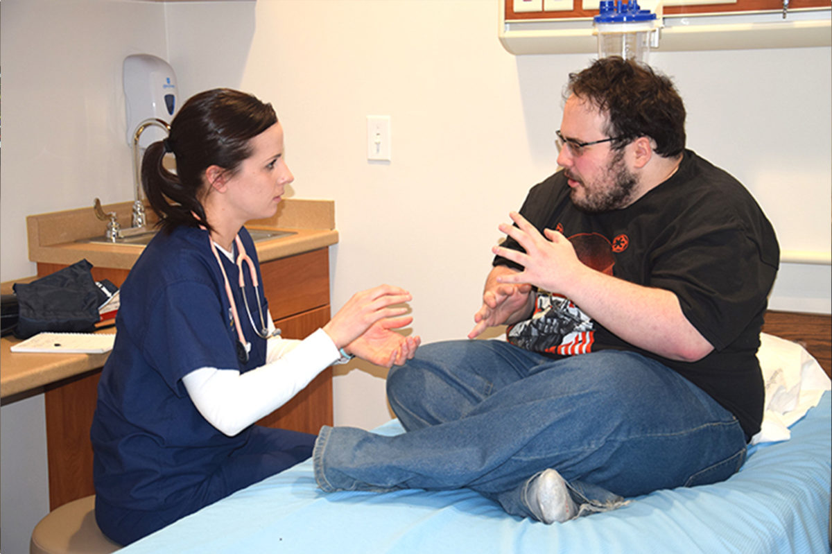 Students in Clarke University BSN Major discussing project - Full Size