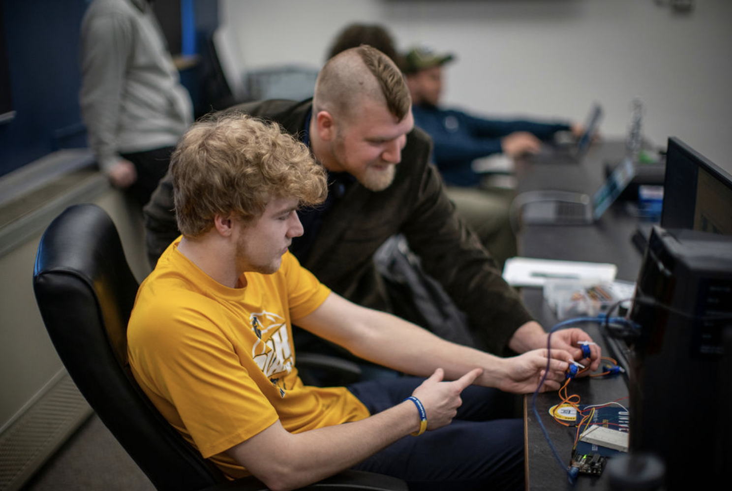 Clarke University Computer Science students troubleshooting a server administration issue