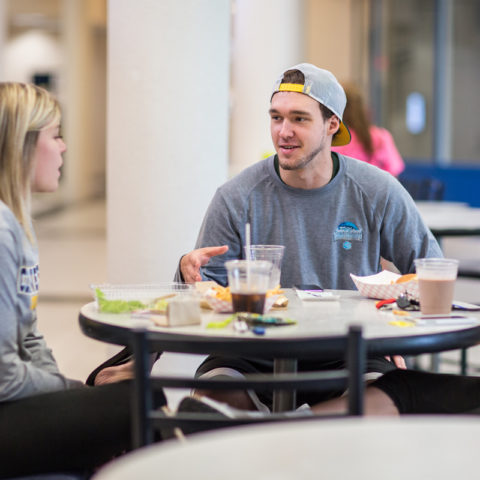 Students enjoying a meal at the Crusader cafe