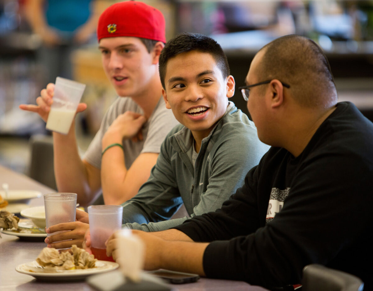 Clarke students enjoying a meal at the dining hall - Full Size