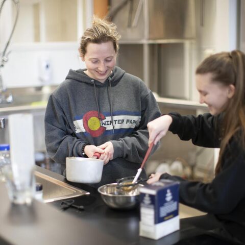 student and faculty working in food science lab