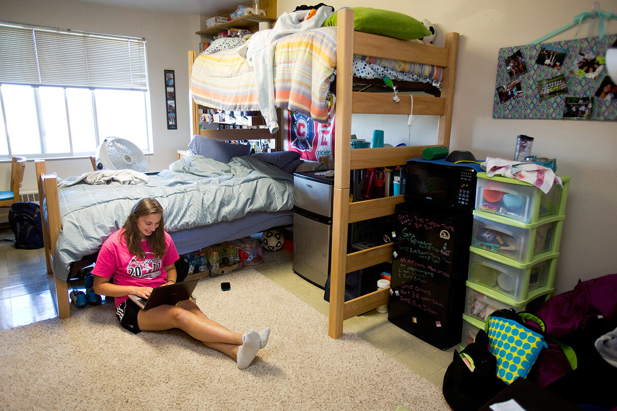 Student in dorm room - Full Size