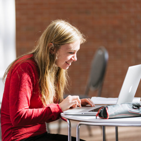 Clarke University Communications Major Student Studying